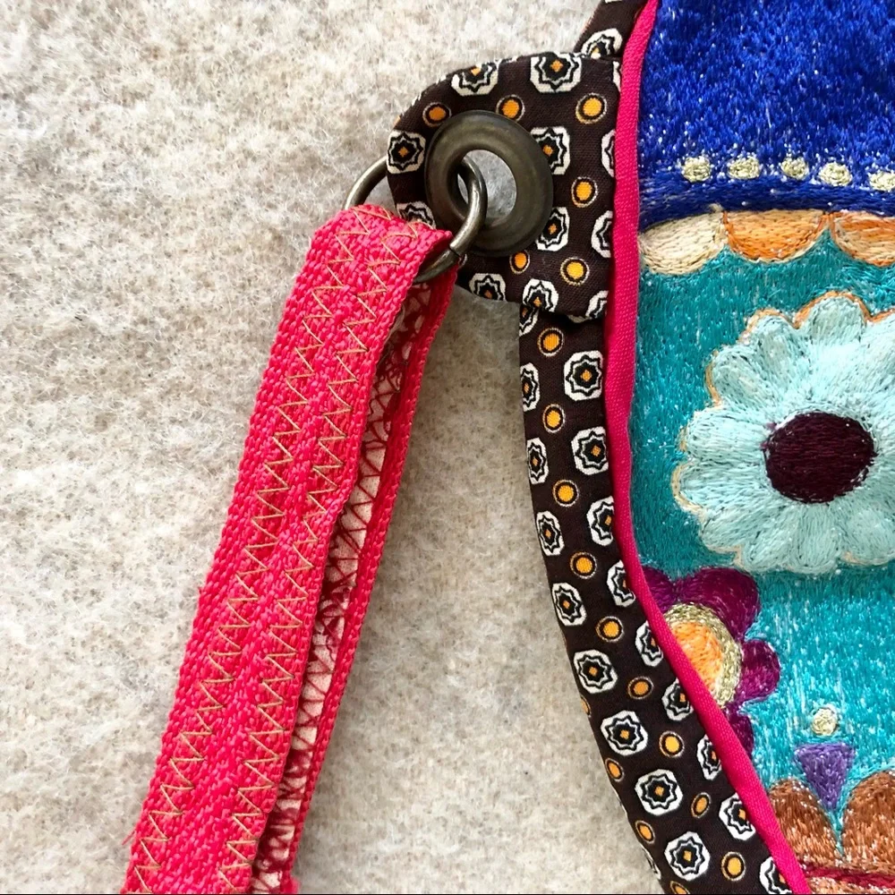 Handmade embroidered Santa Muerte skull wristlet